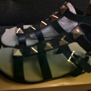 MICHAEL Michael Kors Black Sandals with Gold Accents